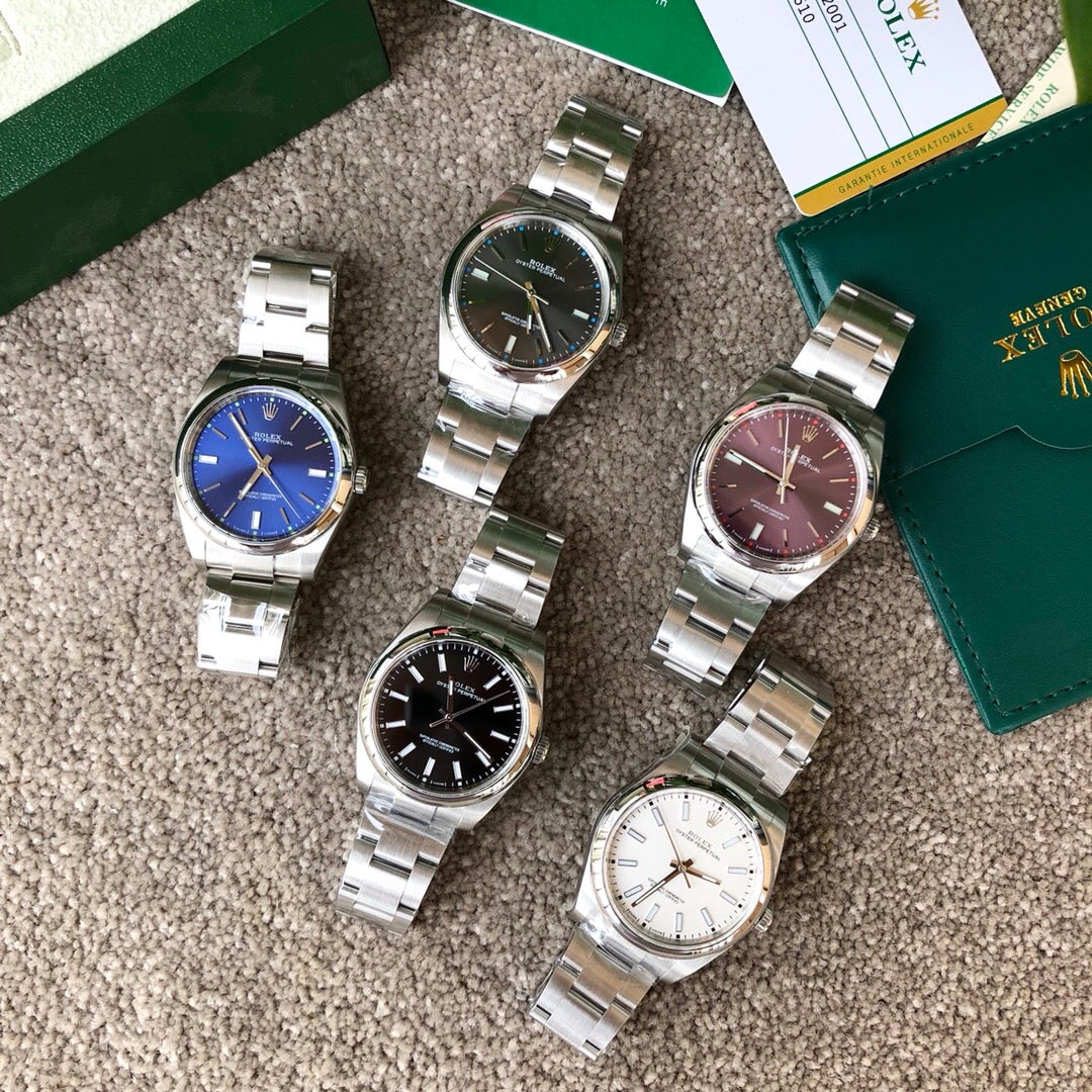 롤렉스 오이스터 퍼페츄얼 39 '레드 그레이프' 39mm 레드 그레이프 다이얼 돔형 베젤 오이스터 브레슬릿