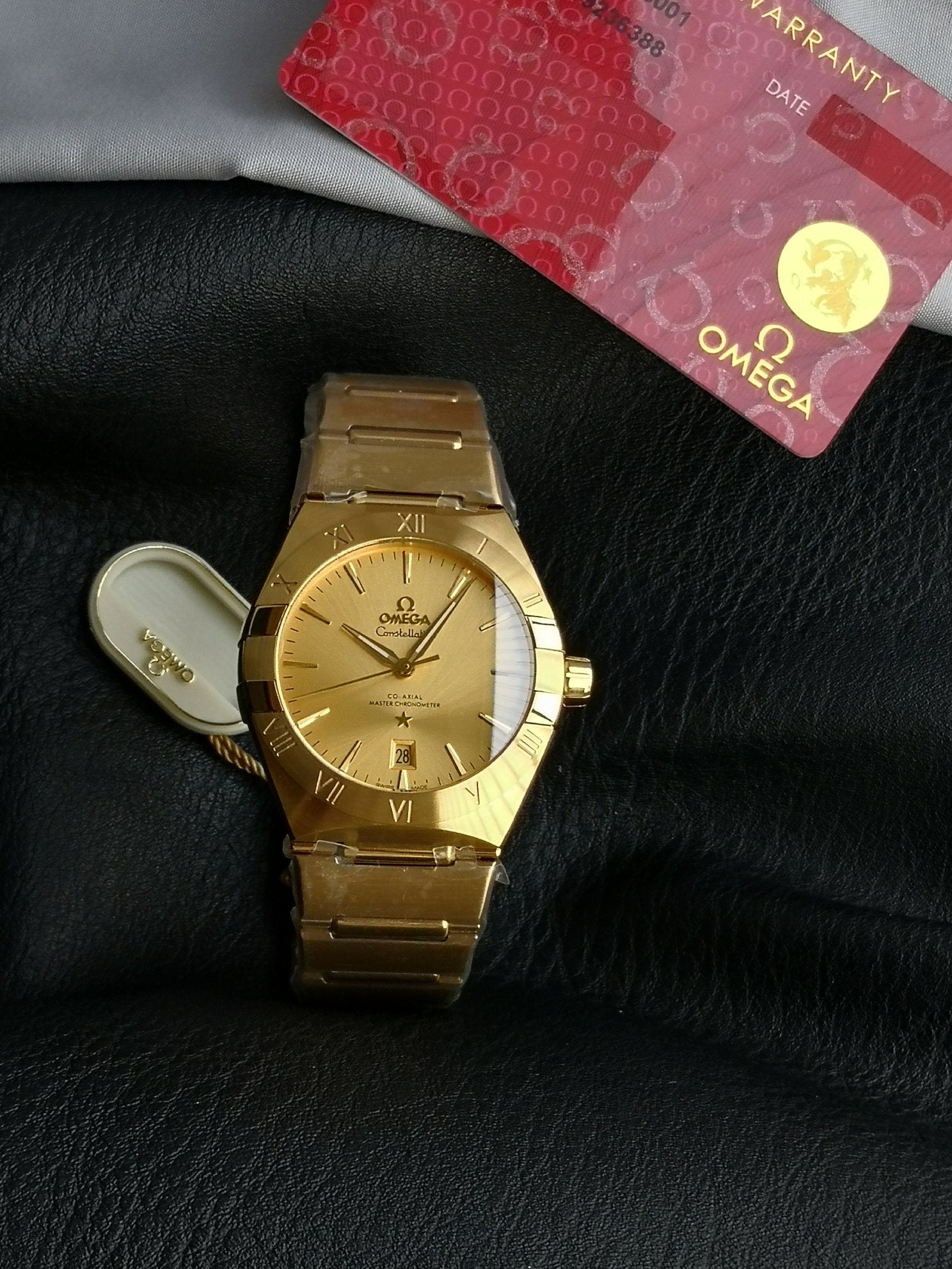 오메가 컨스텔레이션 옐로우 골드 시계 39mm 샴페인 골드